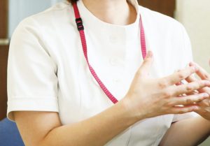 Woman wearing a white coat