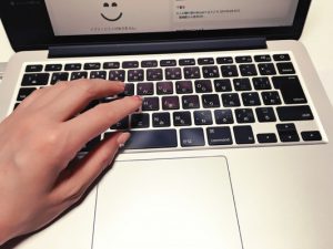 Laptop and hand