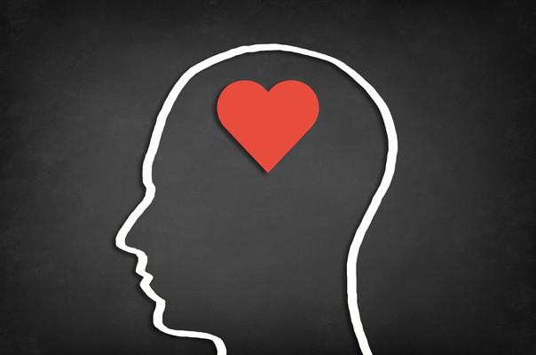 Heart shape in human head. Concept of love.