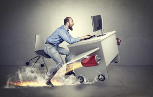 conceptual image, methaphor of busy and fast business, man with airplane desk